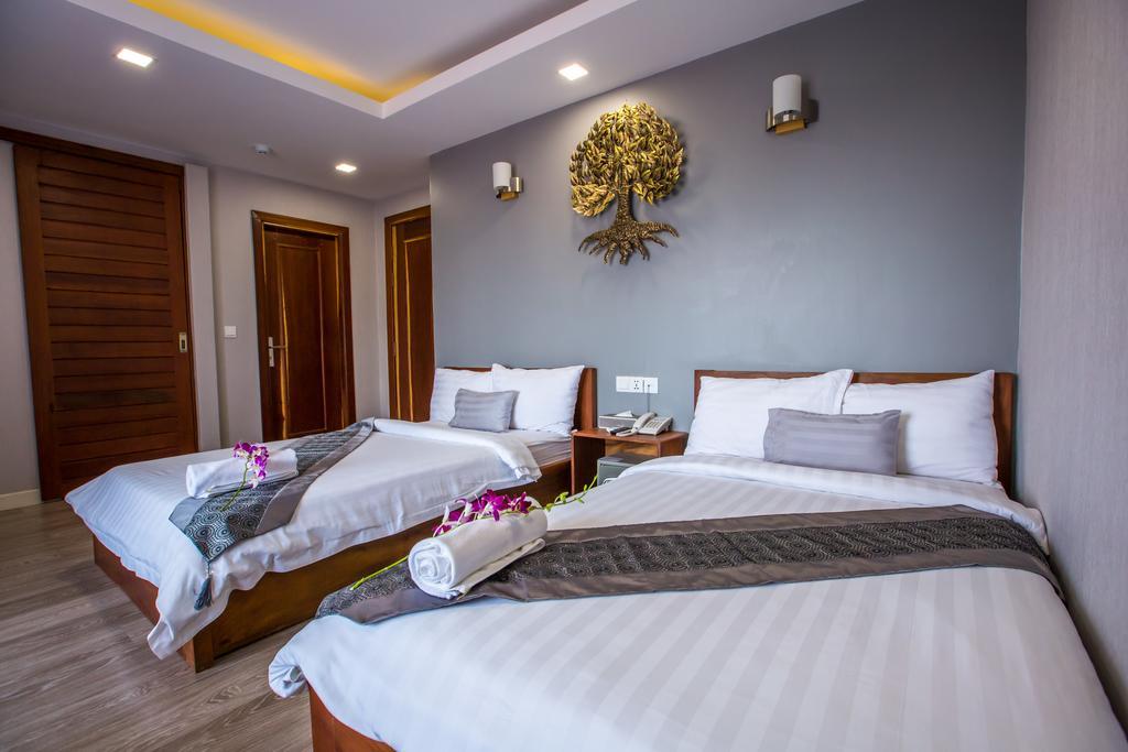 Le Cocon Boutique Hotel Phnom Penh Værelse billede